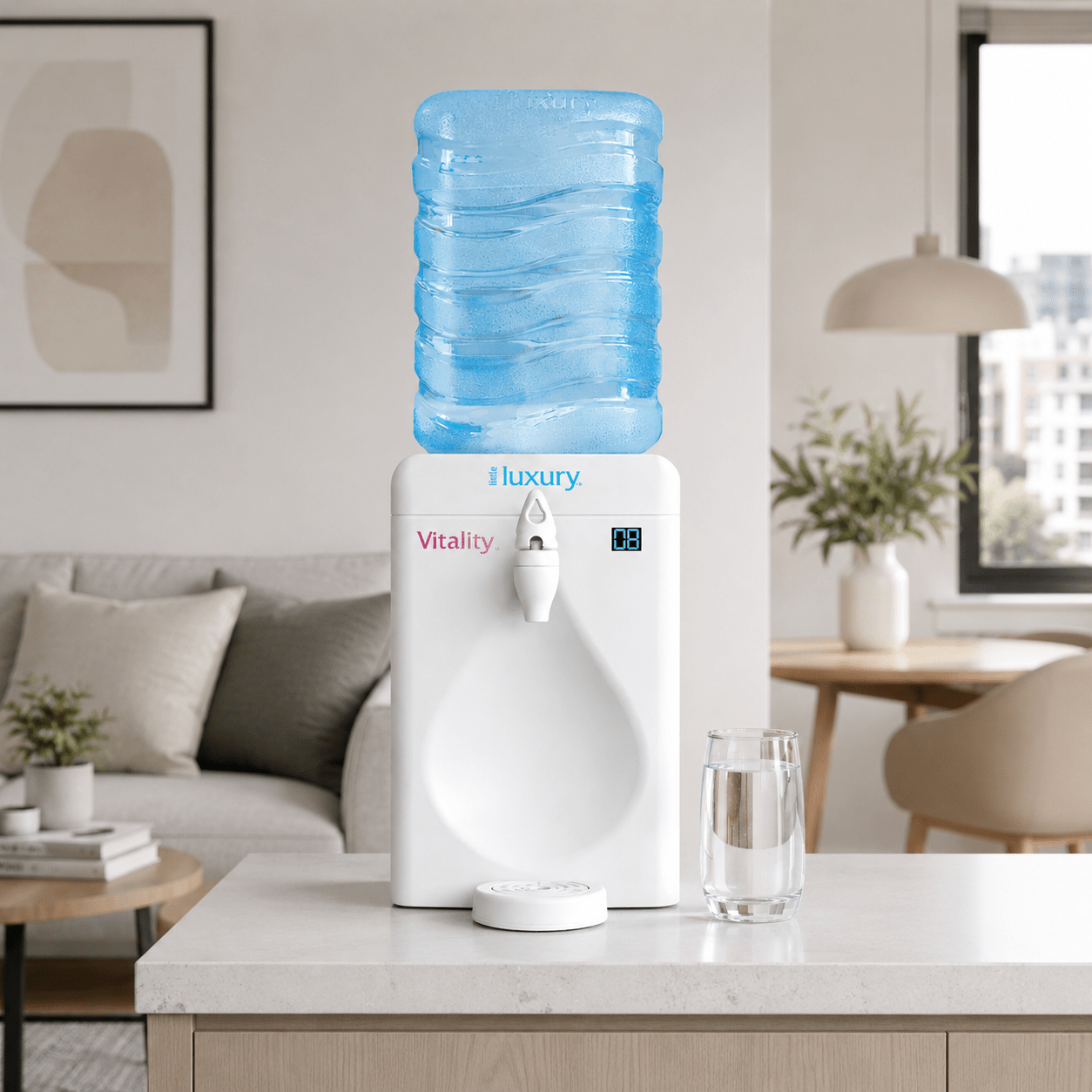 Little Luxury Vitality countertop water cooler with refillable bottle in a modern home