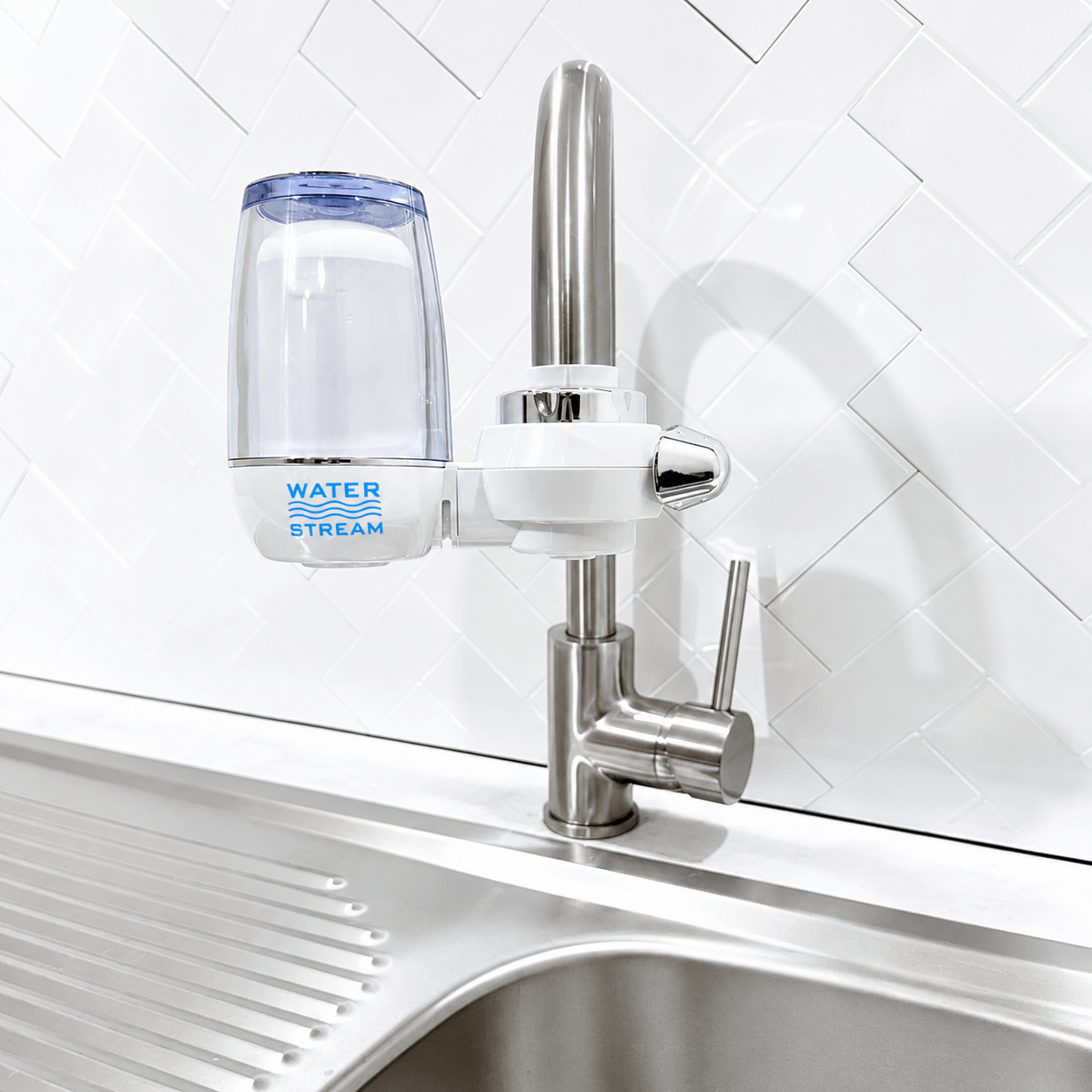Little Luxury Water Stream tap water filter installed on a kitchen tap